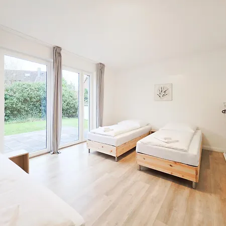 Апартаменты Raj Living - 6 Haus - Grosse Kueche - Garten - Parkplatz - 25min Messe Dus